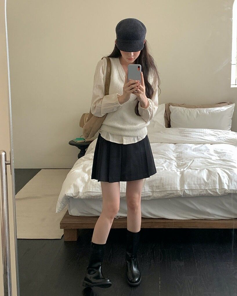 ▲針織背心穿搭     。（圖／翻攝自官網）