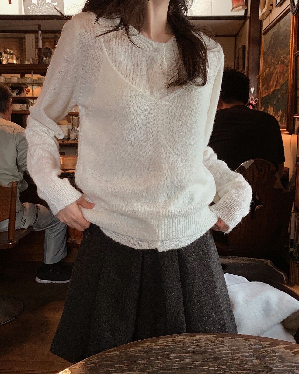 ▲針織背心穿搭 。（圖／翻攝自官網）