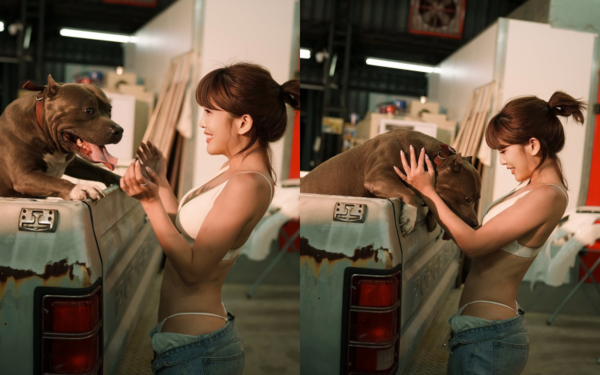 ▲壯壯站在卡車旁，逗弄著卡車上的惡霸犬。（圖／翻攝自Instagram／ula_shen_）