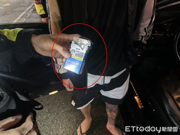 ▲台中Gucci哥掉出K仔空罐緊張了　女警一聞「就是裝那個的」。（圖／記者許權毅翻攝）