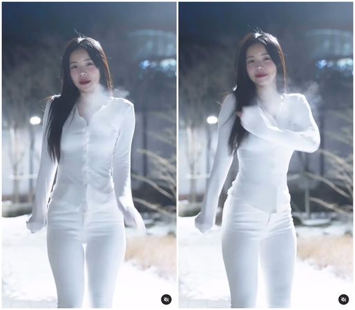 ▲李多慧嘴裡吐出白煙，可見氣溫十分寒冷。（圖／翻攝自Instagram／le_dahye）