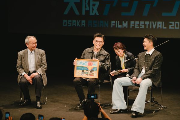 ▲曾敬驊與潘客印導演以《我家的事》登上大阪亞洲電影節。（圖／牽猴子提供）