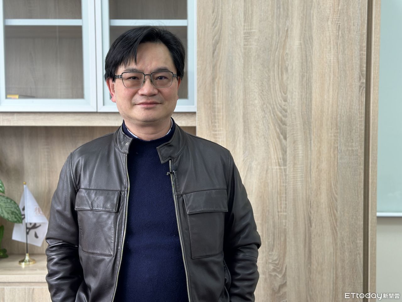 ▲政大商學院副院長周冠男教授提到，他從來沒有開過任何群組，更沒有辦過贈書活動。（圖／記者陳詩璧攝）