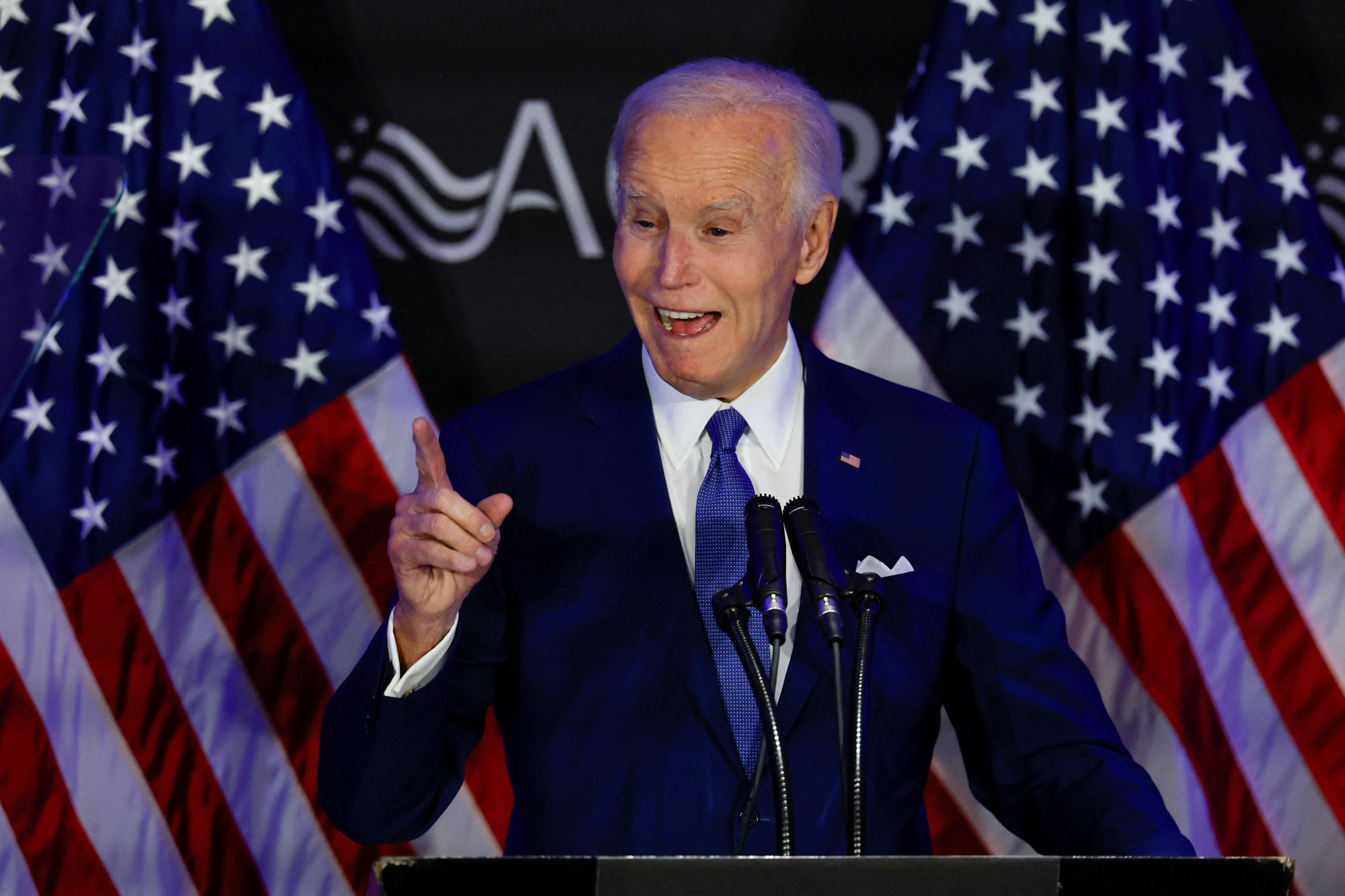 ▲▼拜登15日在芝加哥受邀出席演講,是卸任後首度對外發表談話。(圖/路透)