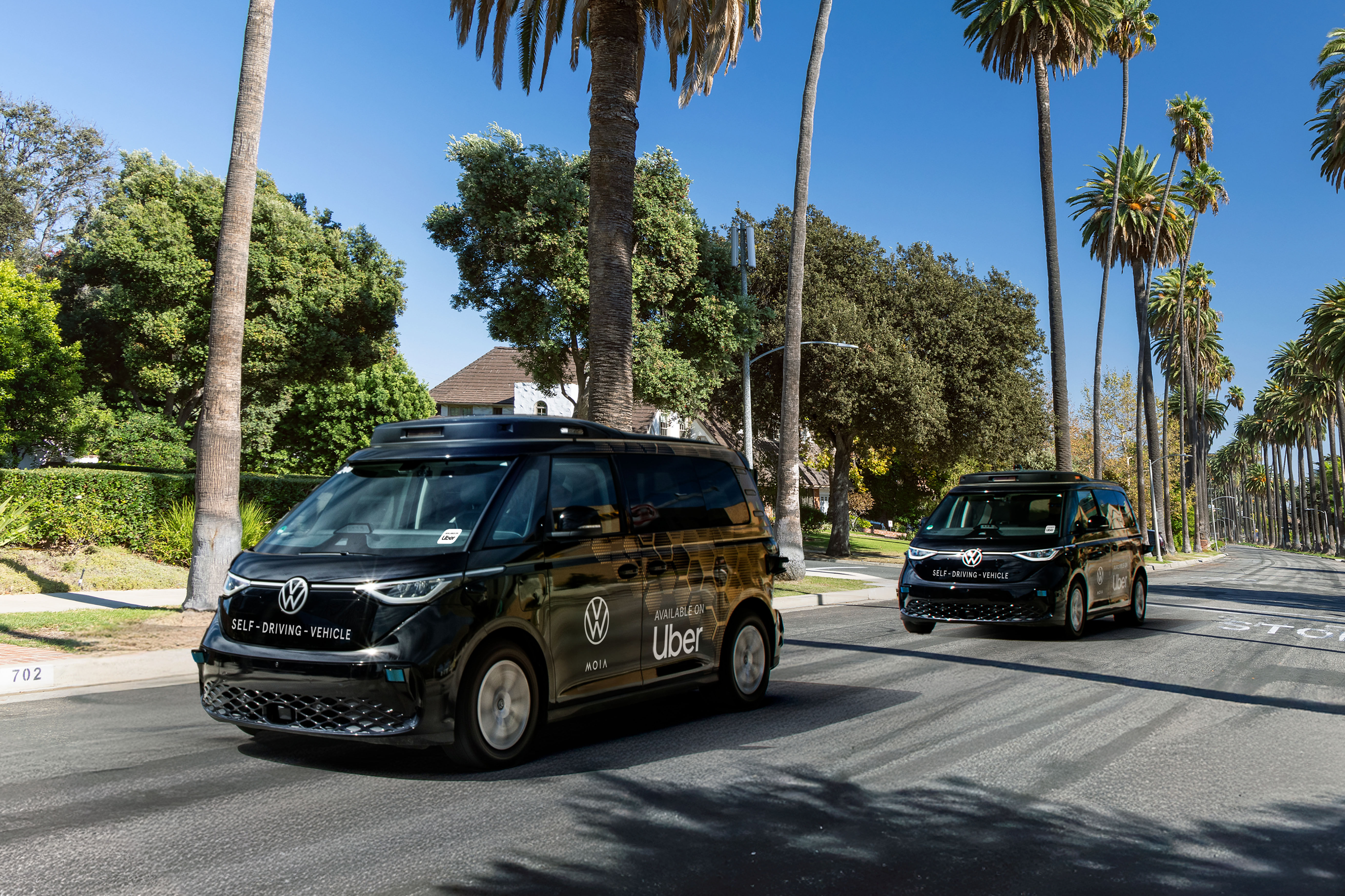 ▲福斯、Uber合作推無人計程車隊。（圖／翻攝自Volkswagen、Uber）