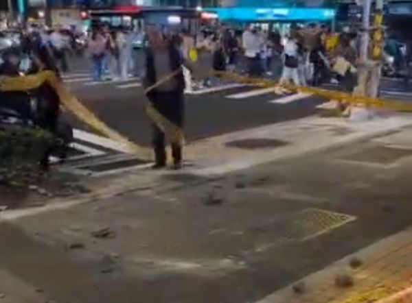▲▼▲北市中山區南京東路、中山北路口大樓磁磚掉落，所幸並無人傷亡。（圖／民眾提供）