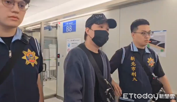 ▲▼快訊／大根涉閃兵回國了！警機場等人　秒帶回新北市刑大。（圖／記者陳煥丞攝）