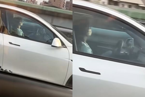 ▲▼女駕駛開特斯拉上路，放雙手閉目養神。（圖／翻攝臉書／八卦村 - 行車紀錄器影片上傳中心）
