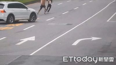 南港情侶吵架！1人半裸衝車道超驚險　涉犯公共危險罪慘了