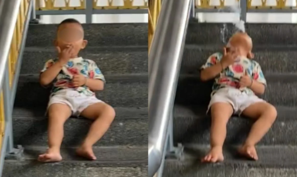 ▲▼泰國年僅4歲的男童獨自玩耍還在抽菸。（圖／翻攝自Facebook／แฟร้งค์` เฟิร์ต ）