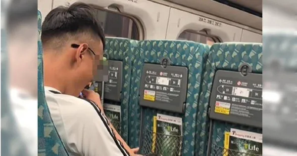 高鐵車廂內一名男子抽電子菸，吐菸瞬間異常抖動。 （圖／翻攝自臉書匿名3公社）