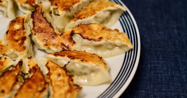 一名女子因為一盤煎餃被男友提分手。（示意圖／翻攝自photoAC）