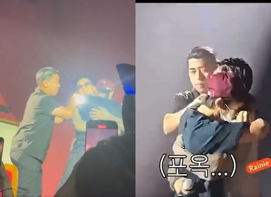 ▲東海上台強抱WINNER成員。（圖／翻攝自微博）