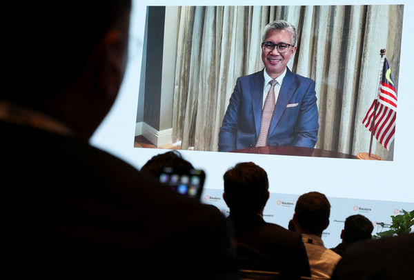 ▲▼馬來西亞「國際貿易及工業部」部長東姑．扎夫魯（Tengku Zafrul Aziz）在新加坡舉行的路透社NEXT Asia峰會發表線上演說。（圖／路透）