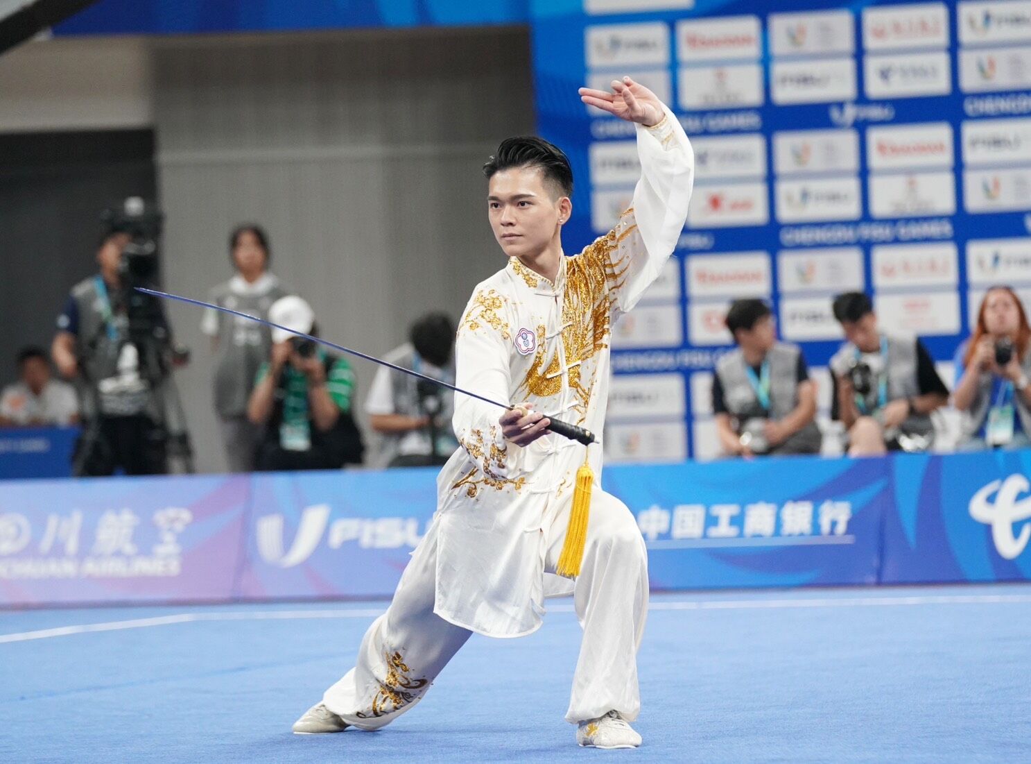 ▲▼2025年世界運動會，中華代表團掌旗官孫家閎、黃渼茜。（圖／體育署提供）