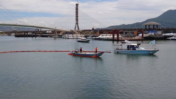 ▲新北淡水河口油污模擬演練。（圖／新北市環保局提供）