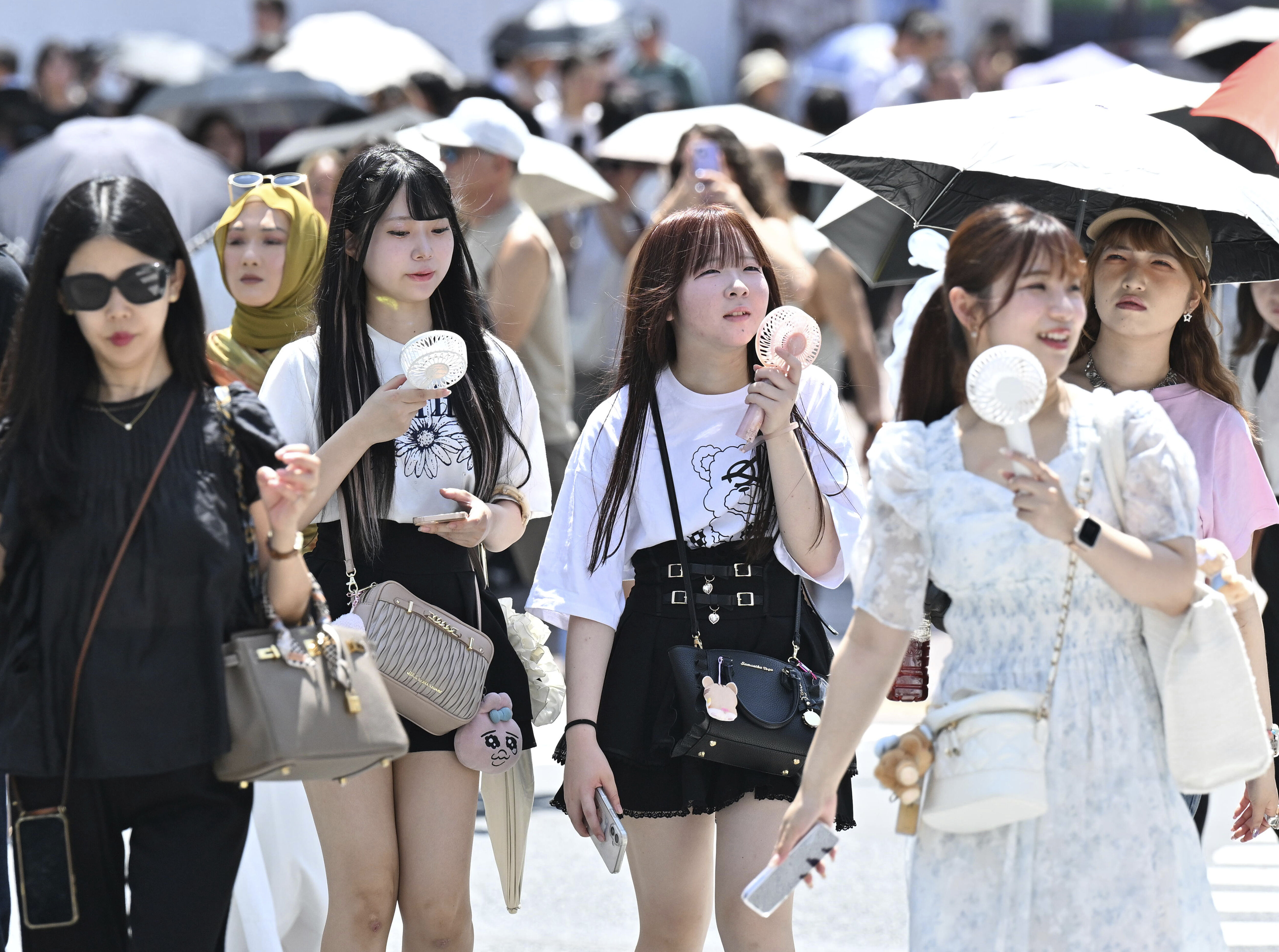 ▲▼日本高溫、日本夏季、日本正妹、日本猛暑。（圖／達志影像／美聯社）