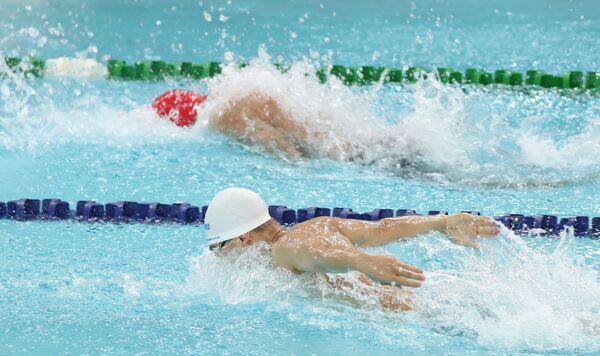 ▲王冠閎在沒有熱身下就游出50蝶個人第三佳成績、年僅15歲的林子芸在女子200蝶摘金、李姵萱今在女子100自摘下第三金。（圖／游泳協會提供）