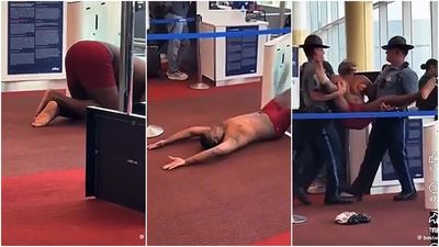 登機門跳脫衣秀!男炫「紅內褲」倒地伸展 下秒全裸乘客傻眼