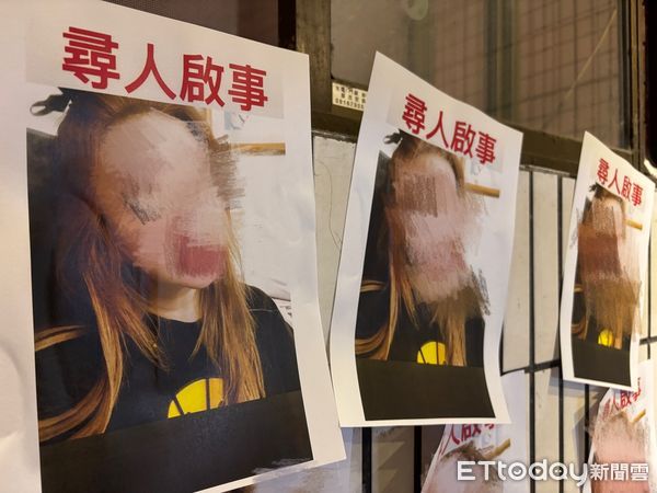 ▲▼北市大樓樓梯間被張貼多張同一名女子的照片，警方也將釐清原因。（圖／記者邱中岳攝）