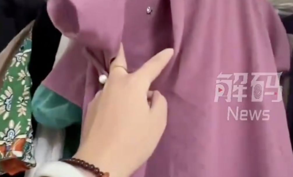 ▲江西一名女子買旗袍時，疑似買到給逝者穿的「壽衣」。（圖／翻攝大象新聞）