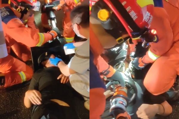 ▲▼騎士出車禍，頭撞進紅綠燈裡面。（圖／翻攝微博）