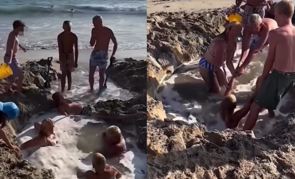 海水突然漲潮「2男童受困淹水沙坑」　民眾瘋狂挖沙救人畫面曝。（圖／翻攝自X）