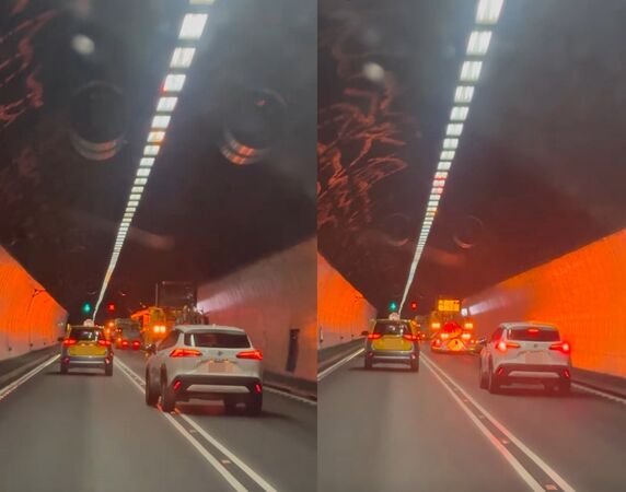 ▲白色休旅車爽開雪隧封閉的外側車道，網批：好瞎、任性。（圖／翻攝自threads）