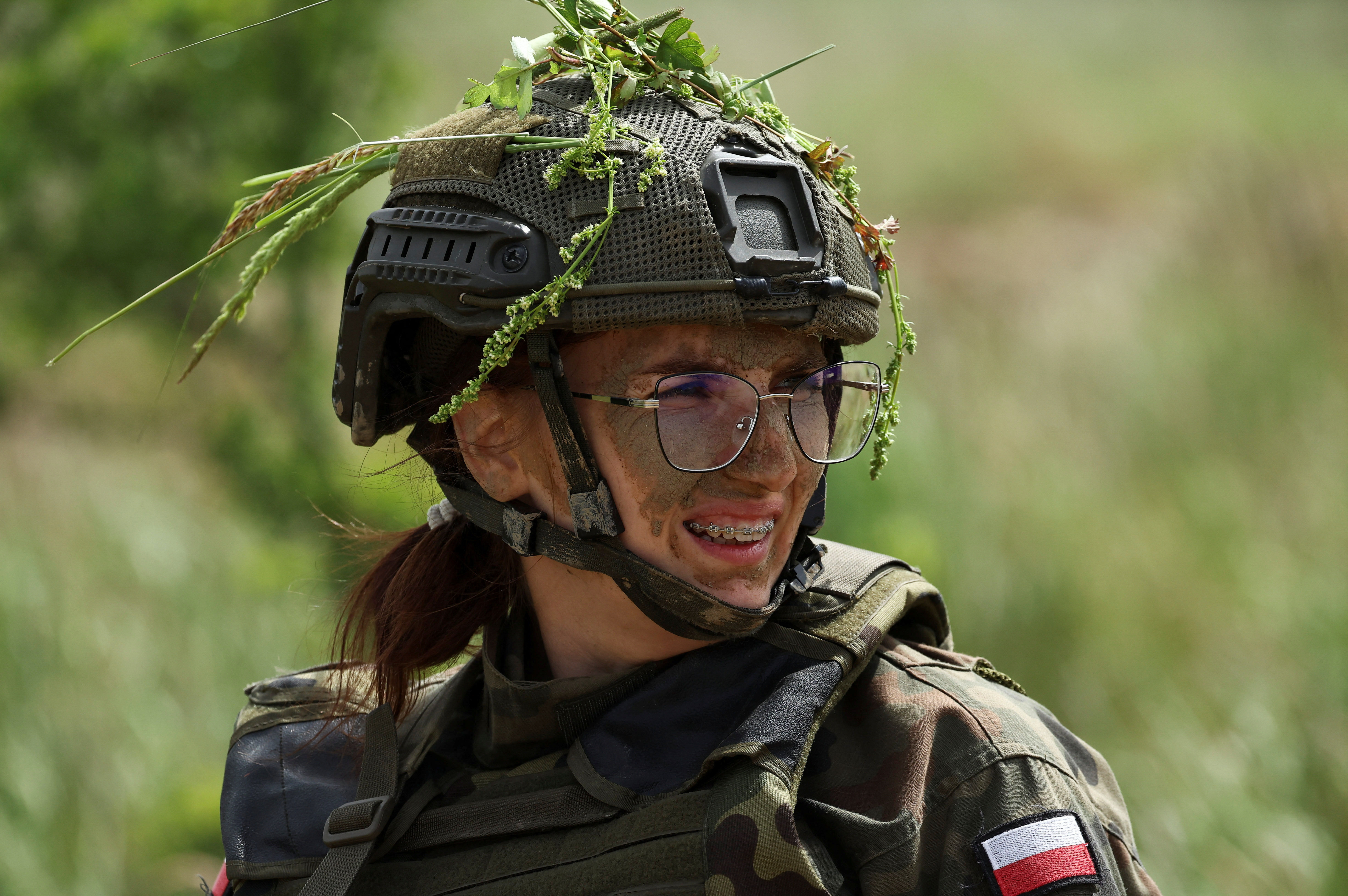 ▲▼36歲行政人員耶德魯薩克前往波蘭北部布拉涅沃,與其他新兵一同參加自願軍事訓練。(圖/路透)