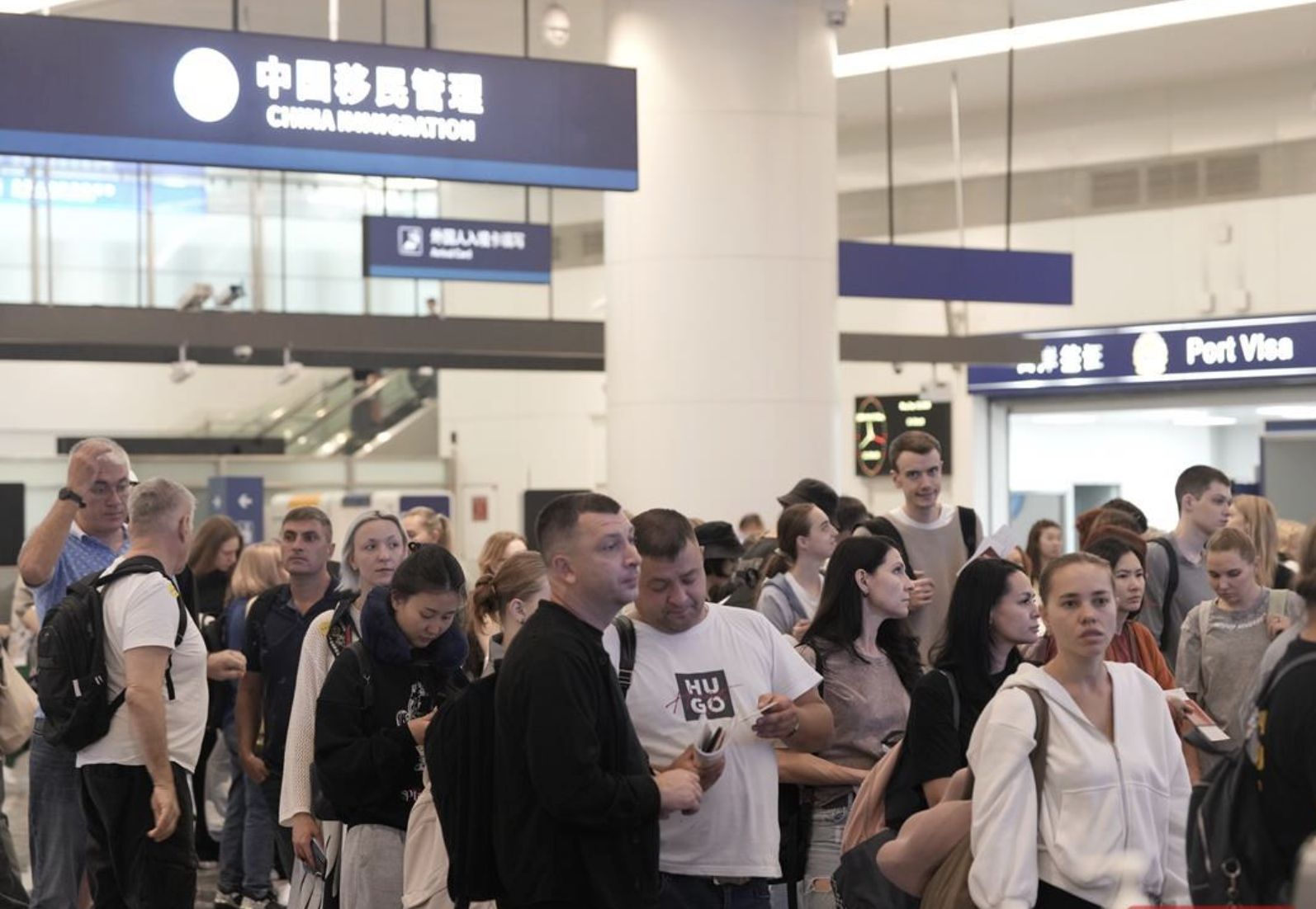 ▲俄羅斯126名旅客成為武漢機場首批享免簽證入境的遊客。（圖／翻攝極目新聞）