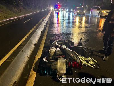 驚險畫面曝!北市女騎士雨夜載10歲兒 撞分隔島人車噴飛墜地