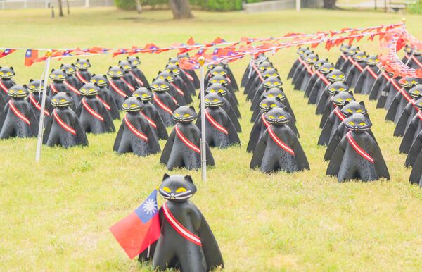 ▲桃園市風禾公園明天將舉桃園國慶升旗典禮，70隻黑貓中隊現身意外讓民眾驚喜。（圖／市府民政局提供）