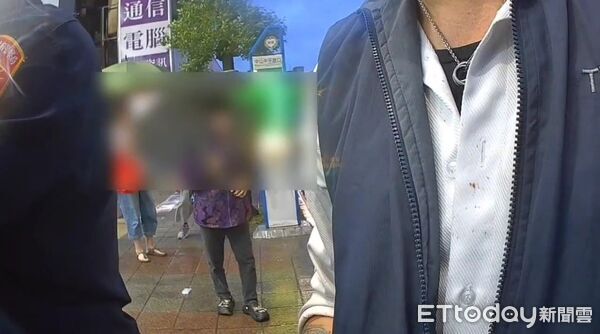 ▲司機憤怒向警方表示「我也有被打到啊」。（圖／記者沈繼昌翻攝）