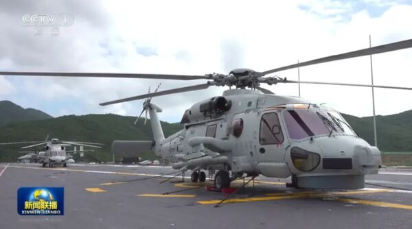 ▲▼2架直-20F反潛直升機首度公開亮相福建艦航母飛行甲板。（圖／翻攝自央視）