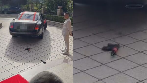 ▲▼天道盟正義會劉姓大哥嫁女兒，新娘在傳統古禮「丟扇子」環節時，改丟玩具槍             。（圖／記者沈繼昌翻攝）