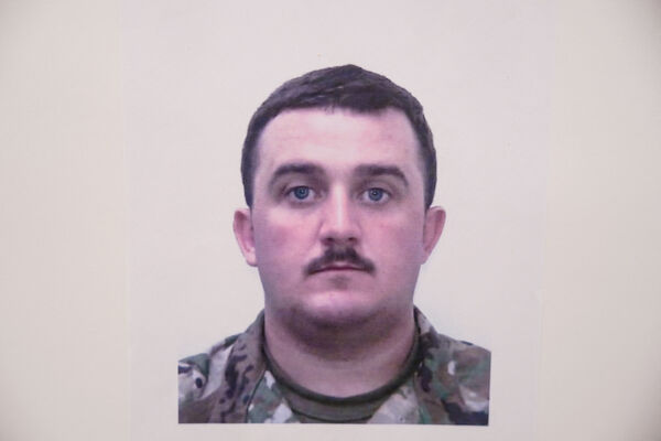 ▲▼遭槍擊的國民兵沃爾夫（Andrew Wolfe）。（圖／路透）