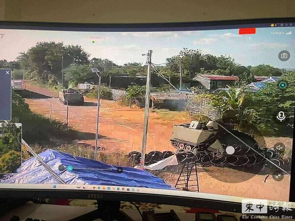 ▲▼ 柬埔寨前線監視器畫面顯示，泰軍裝甲車越境逼近柬埔寨村莊，武裝人員在民宅附近活動。。（圖／翻攝自柬中時報）