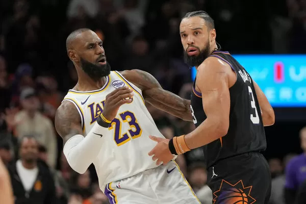 ▲湖人詹姆斯、太陽布魯克斯。（圖／達志影像／美聯社）