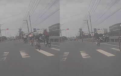 單車集體闖紅燈「警在旁滑手機」！高雄百K賽挨轟：比賽就無敵？