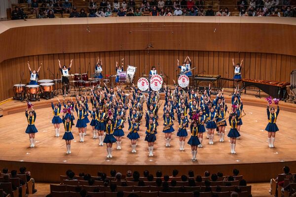 ▲▼被封為「橘色惡魔」的日本京都橘高校吹奏樂部，以及「翡翠騎士」東京農大二高吹奏樂部，昨天（21日）結束在台灣一系列的演出。（圖／文總提供）