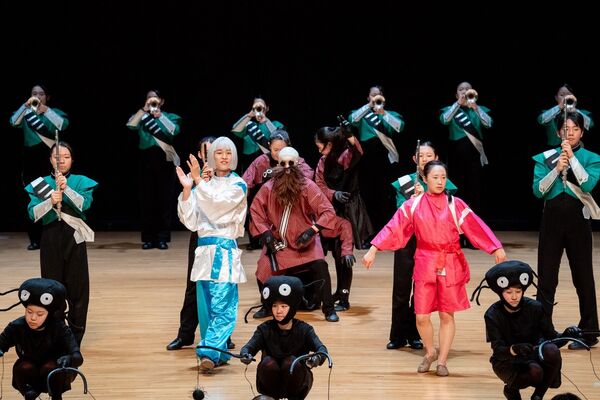 ▲▼被封為「橘色惡魔」的日本京都橘高校吹奏樂部，以及「翡翠騎士」東京農大二高吹奏樂部，昨天（21日）結束在台灣一系列的演出。（圖／文總提供）