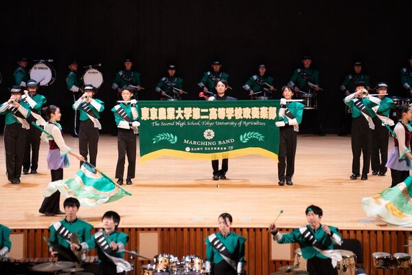 ▲▼被封為「橘色惡魔」的日本京都橘高校吹奏樂部，以及「翡翠騎士」東京農大二高吹奏樂部，昨天（21日）結束在台灣一系列的演出。（圖／文總提供）