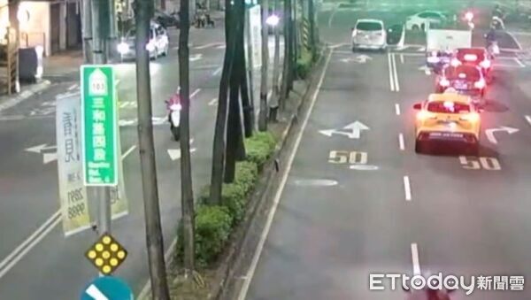 ▲▼ 違規過馬路爆衝突！男趴引擎蓋「不給離開」　遭甩下車影像曝 。（圖／記者陳以昇翻攝）