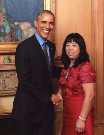 崔麗杰曾與前美國總統歐巴馬合照，風光一時。（網路照片）