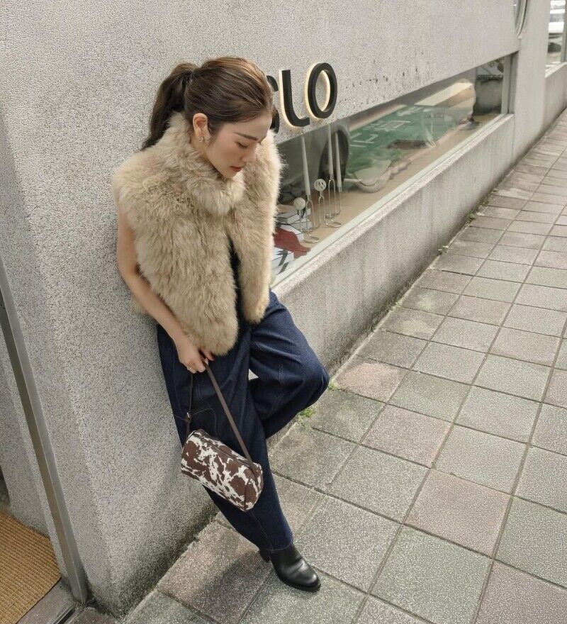 寒流穿搭救星，逆齡教主許路兒的「青春儲值穿搭法」：一頂帽子、一條圍巾讓冬天很時髦