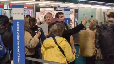 91分鐘成功登頂台北101！霍諾德今離台　機場與粉絲親切合照