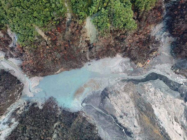 馬太鞍溪堰塞湖江降挖成功終於見底。（翻攝林業保育署花蓮分署官網）