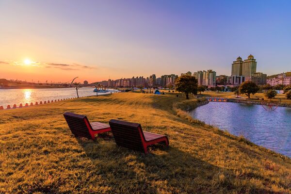 ▲北市擁有長達112公里的河濱自行車道，平坦寬闊，串聯起28座河濱公園。（圖／北市水利處提供）