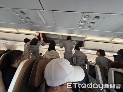 飛機行李架「不要放1物」慘變水濂洞！一票苦主：一堆人講不聽