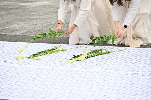 ▲▼巨幅二二八受難者名單。（圖／台灣基進提供）